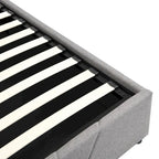 Lit plateforme rembourré avec système de rangement hydraulique sous le lit