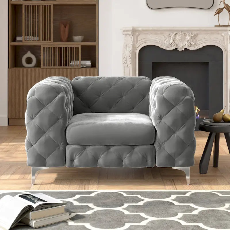 Fauteuil club Chesterfield en velours capitonné avec pieds en L chromés