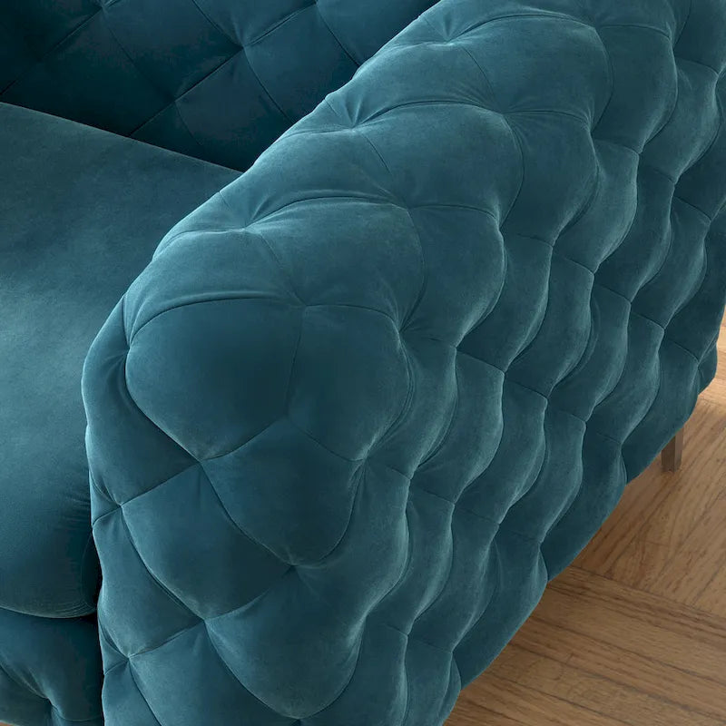 Fauteuil club Chesterfield en velours capitonné avec pieds en L chromés