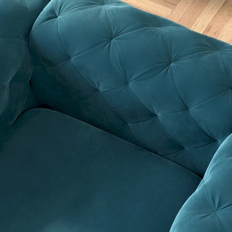 Fauteuil club Chesterfield en velours capitonné avec pieds en L chromés