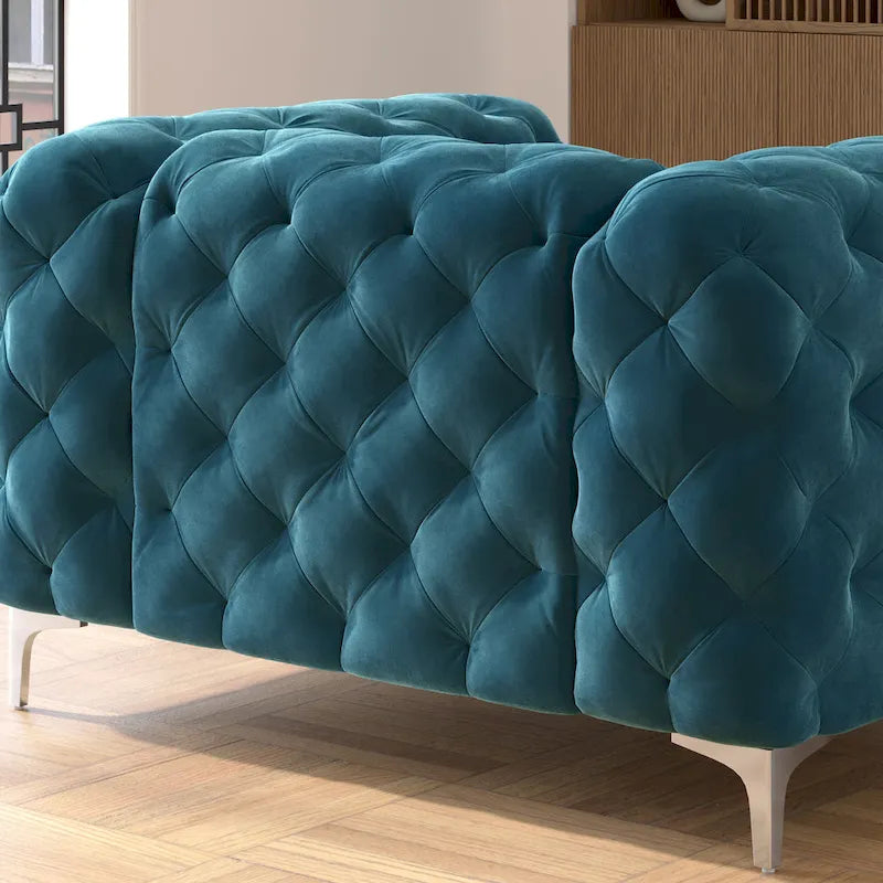 Fauteuil club Chesterfield en velours capitonné avec pieds en L chromés