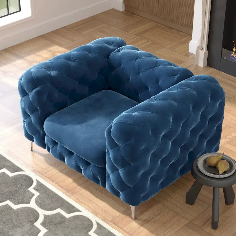 Fauteuil club Chesterfield en velours capitonné avec pieds en L chromés