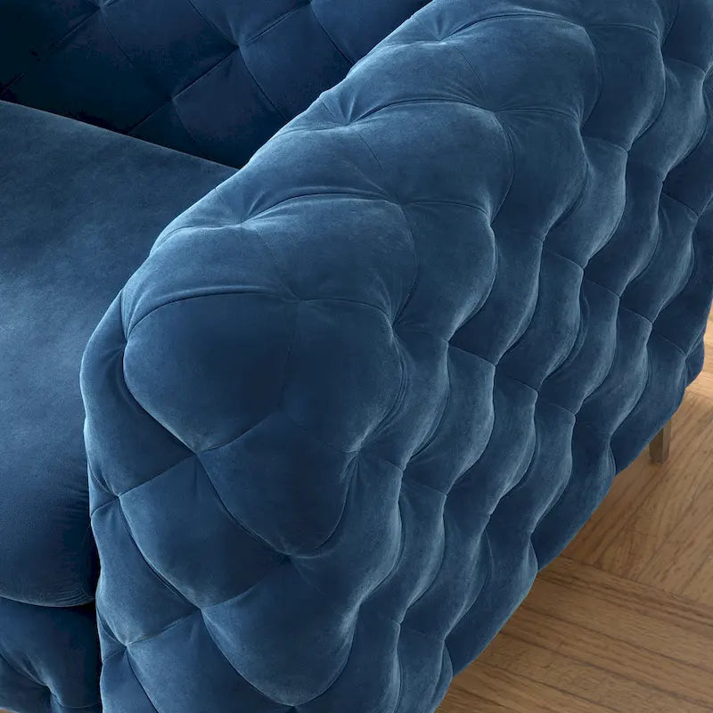 Fauteuil club Chesterfield en velours capitonné avec pieds en L chromés
