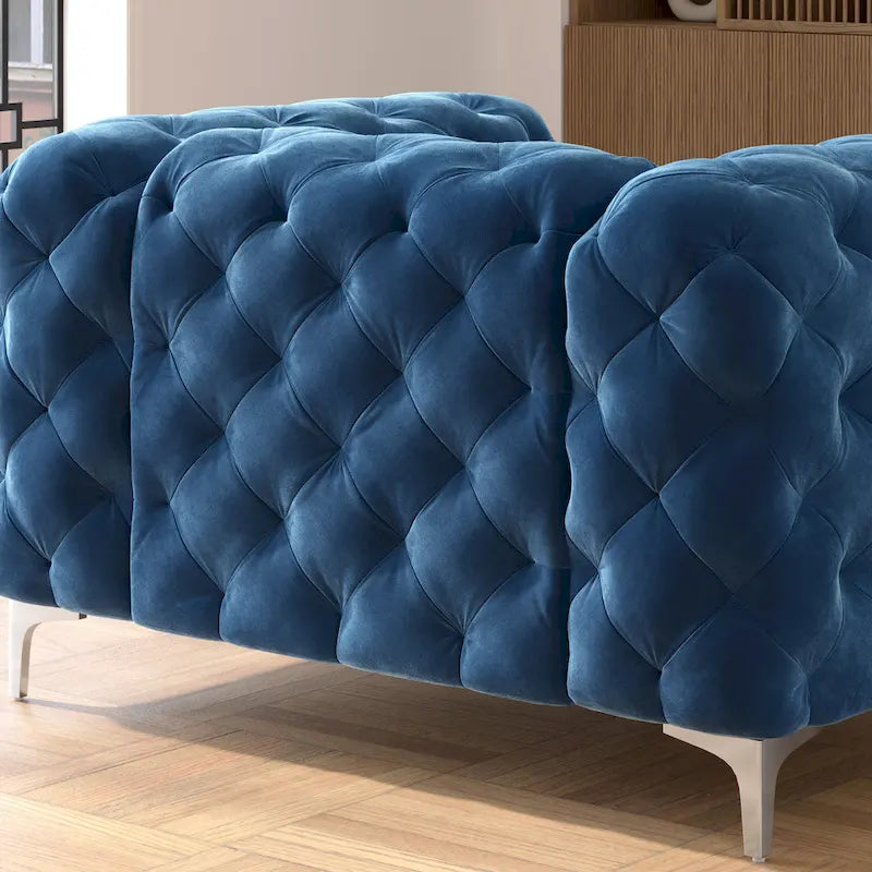 Fauteuil club Chesterfield en velours capitonné avec pieds en L chromés