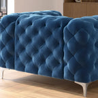 Fauteuil club Chesterfield en velours capitonné avec pieds en L chromés