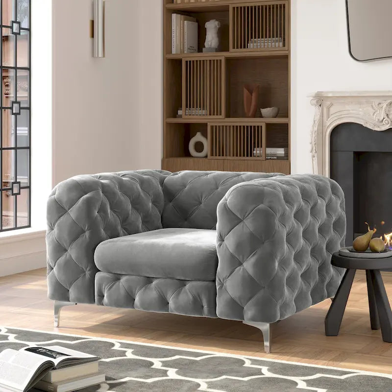 Fauteuil club Chesterfield en velours capitonné avec pieds en L chromés