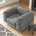 Fauteuil club Chesterfield en velours capitonné avec pieds en L chromés