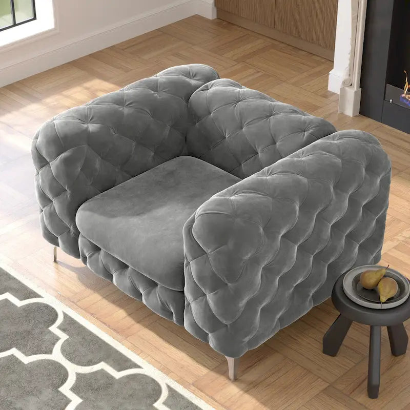 Fauteuil club Chesterfield en velours capitonné avec pieds en L chromés