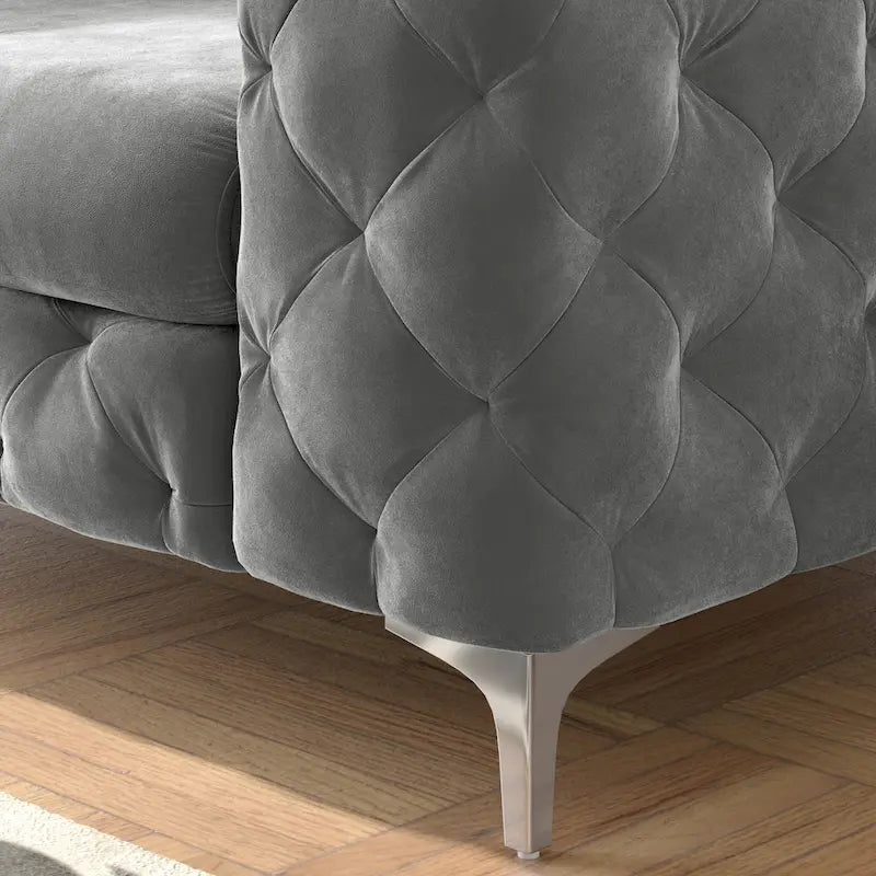 Fauteuil club Chesterfield en velours capitonné avec pieds en L chromés