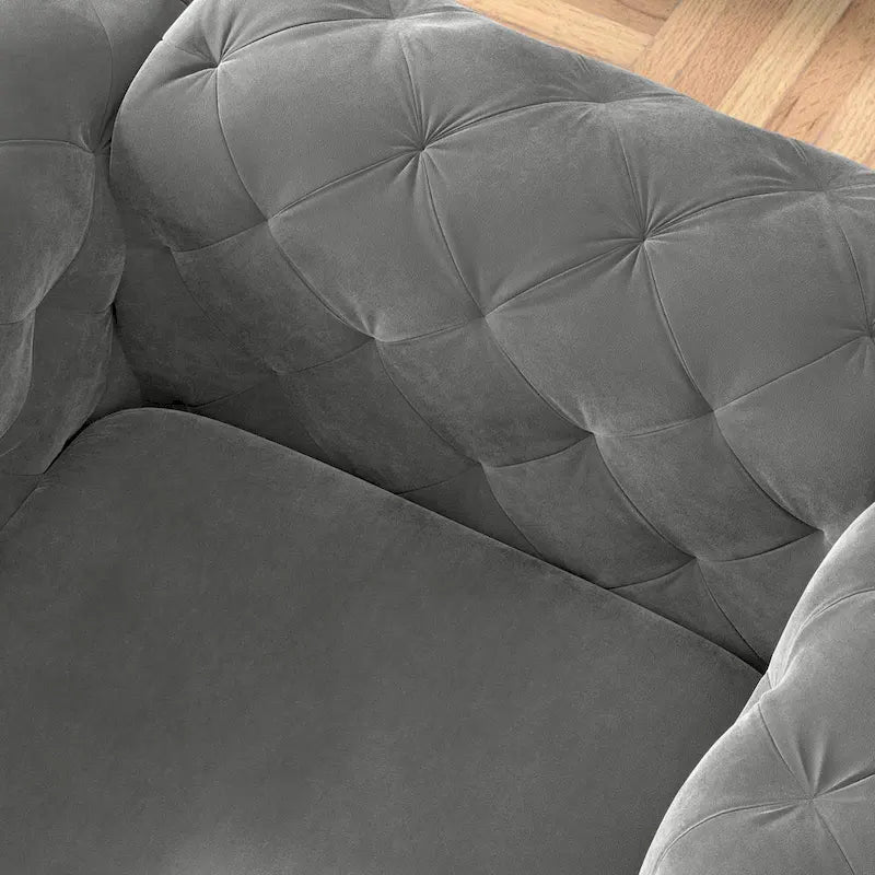 Fauteuil club Chesterfield en velours capitonné avec pieds en L chromés