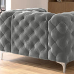 Fauteuil club Chesterfield en velours capitonné avec pieds en L chromés